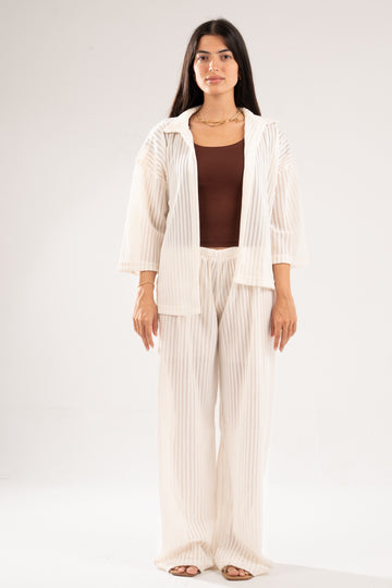 OFF-WHITE SEMI SHEER KNITTED PANTS