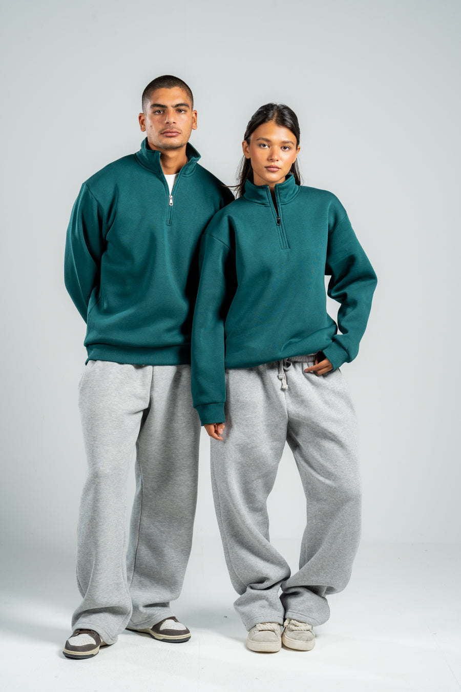 QUARTER-ZIP TEAL SWEATSHIRT