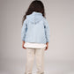 Child wearing a light blue denim jacket on a plain background