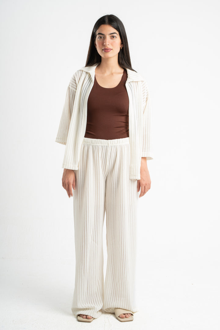 OFF-WHITE SEMI SHEER KNITTED PANTS