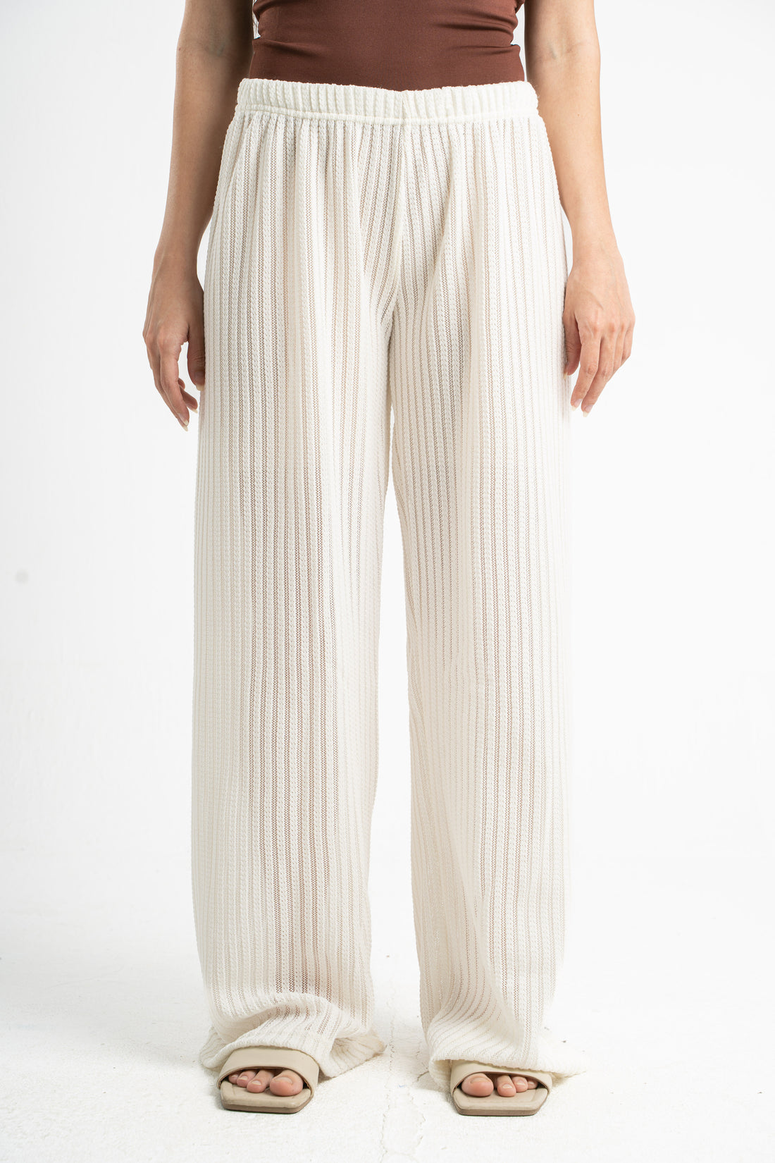 OFF-WHITE SEMI SHEER KNITTED PANTS