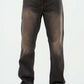 Dark jeans worn by a person on a white background