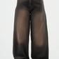 Brown wide-leg jeans on a white background