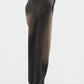 Brown wide-leg jeans on a white background