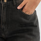 Brown wide-leg jeans on a white background