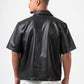 Man wearing a black leather jacket on a white background