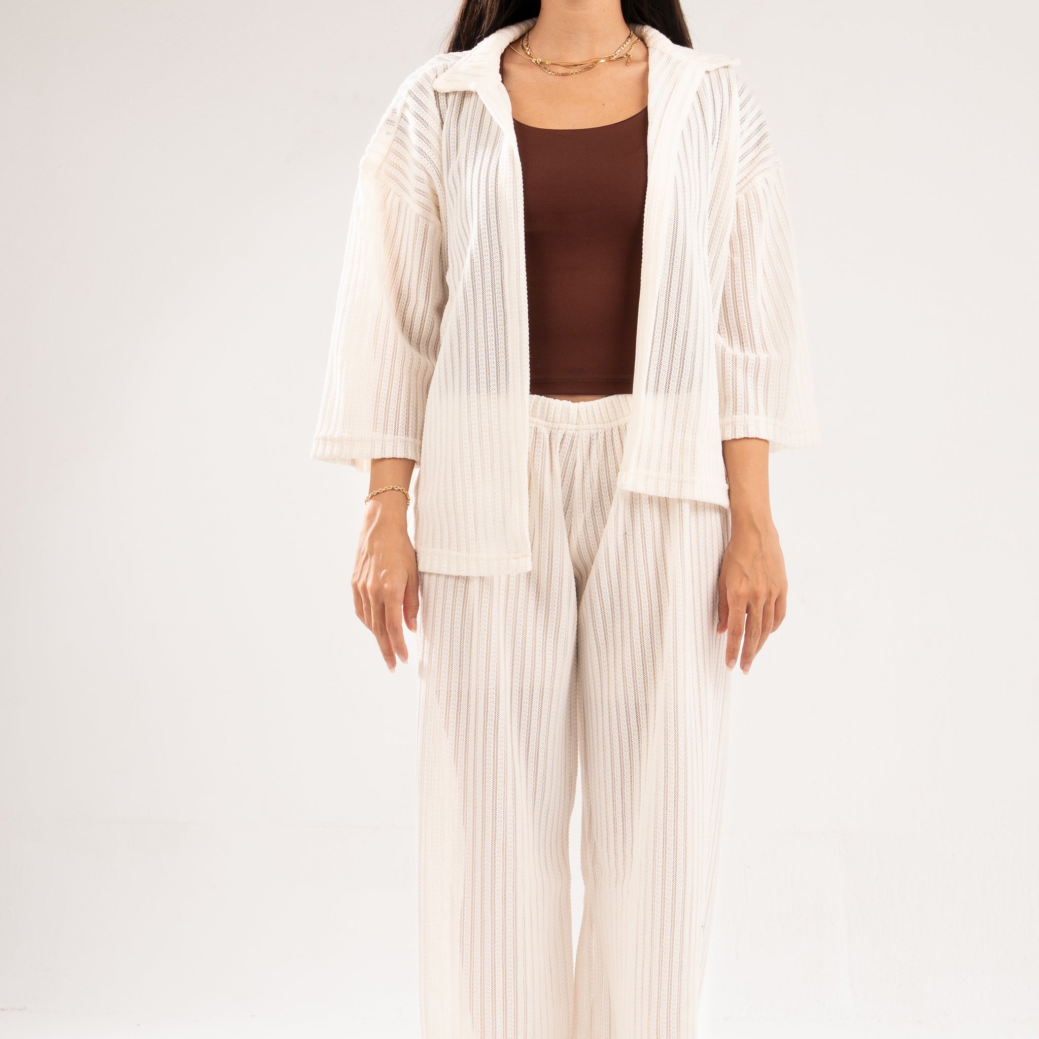 OFF-WHITE SEMI SHEER KNITTED PANTS