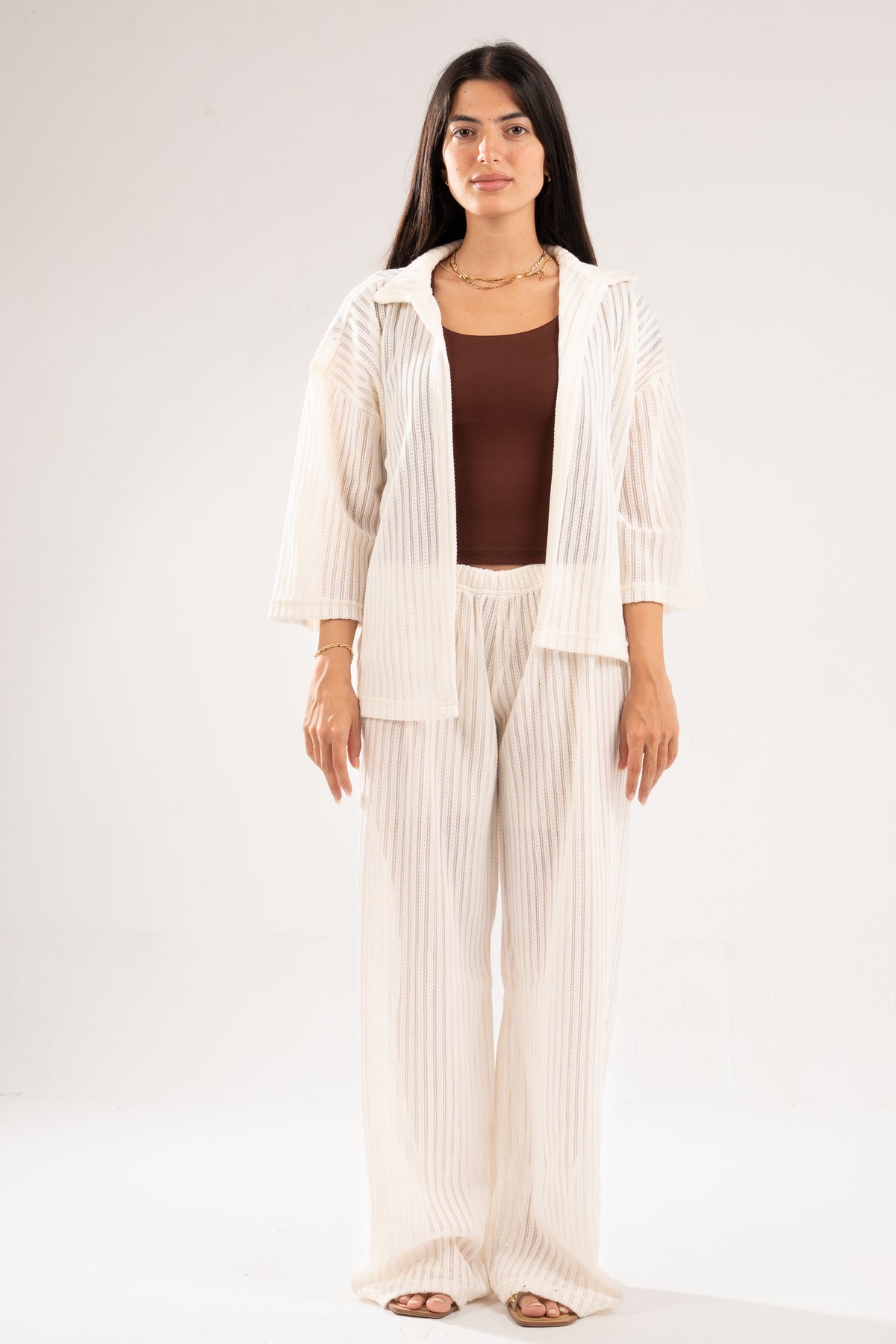 OFF-WHITE SEMI SHEER KNITTED PANTS
