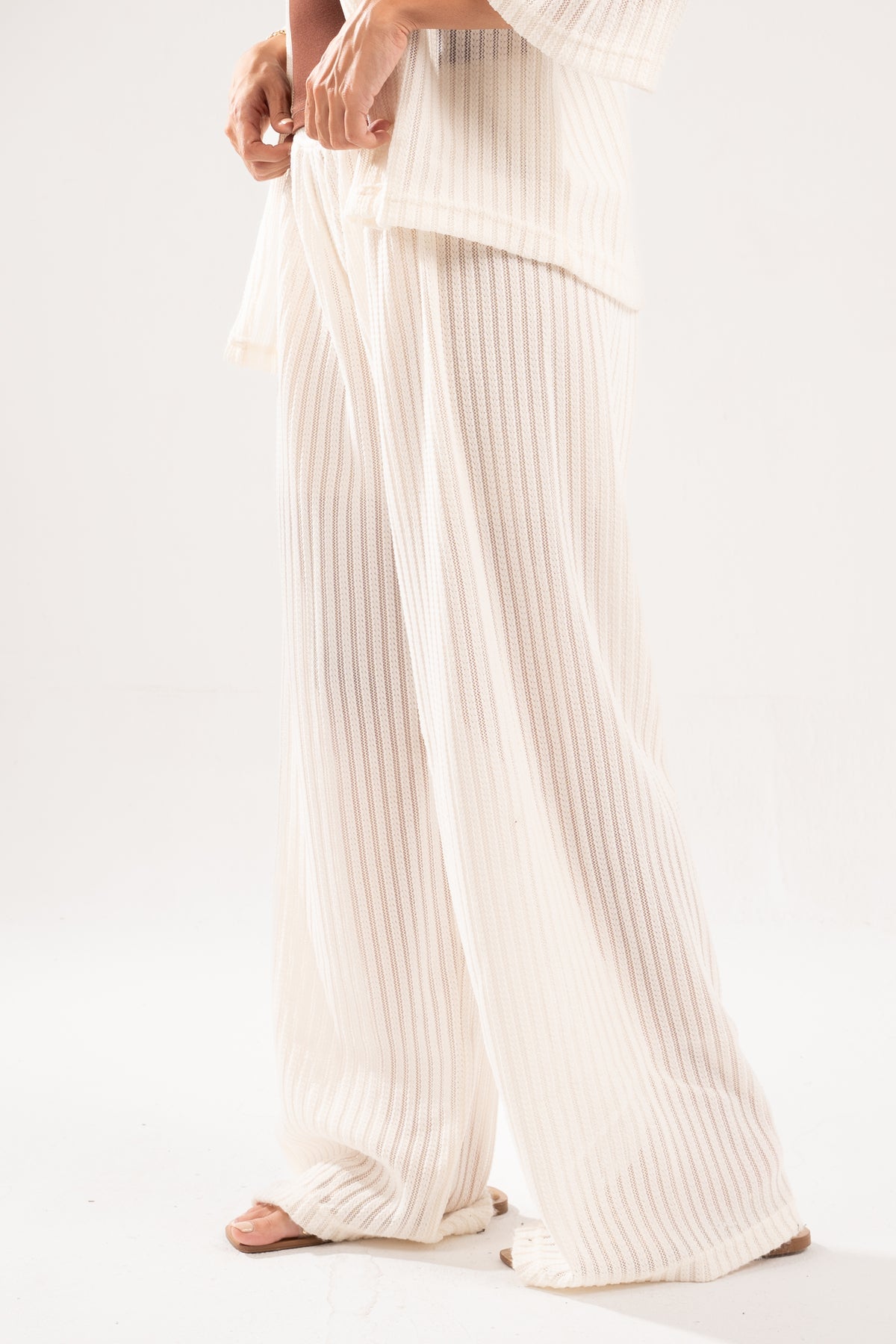 OFF-WHITE SEMI SHEER KNITTED PANTS