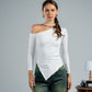 Woman wearing a white off-shoulder top and green pants against a gray background