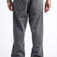 Person wearing gray jeans on a white background
