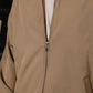 Close-up of a beige jacket with a zipper