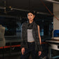 Woman wearing a scarf in an industrial setting