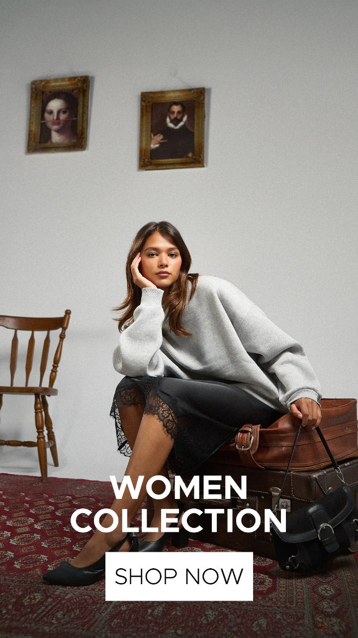 Woman wearing  grey crewneck