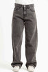 Gray jeans worn by a person on a white background