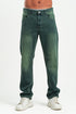 Green jeans worn by a person on a white background