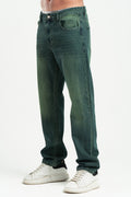 Green jeans worn by a person on a white background