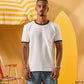 a man wearing an off-white t-shirt with a contrast brown neckline and sleeve trim 
